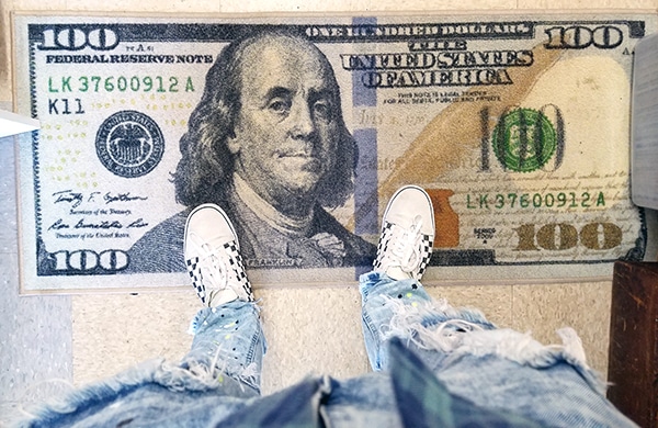 $100 door mat