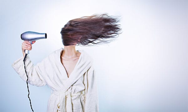 hairdryer in face