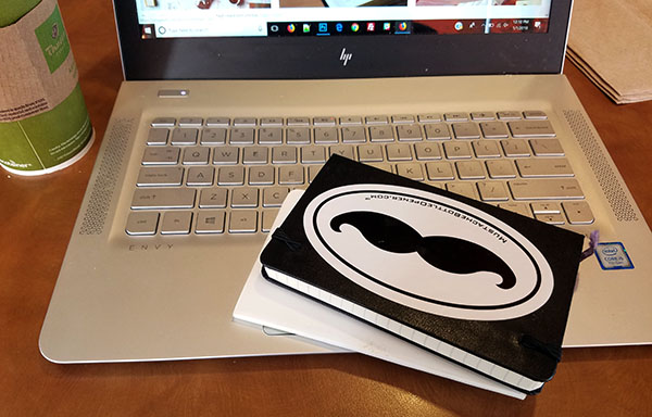 laptop journal coffee