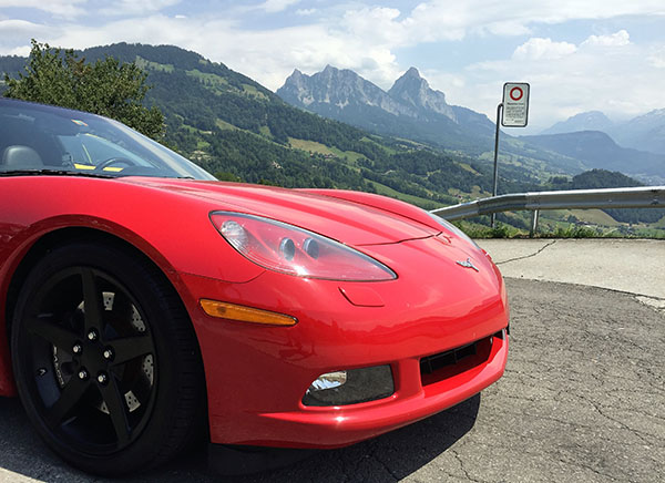 red convertible corvette scenery