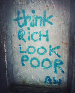 think rich look poor