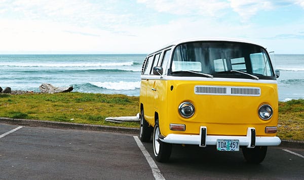 yellow vw bus beach